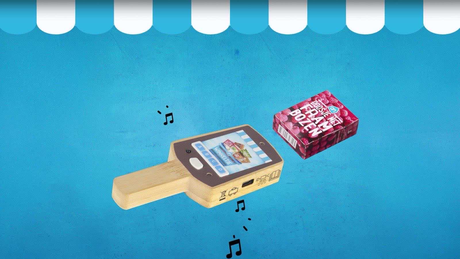 A toy scanner beside a miniature raspberry punnet in an Albert Heijn stop-motion frame.