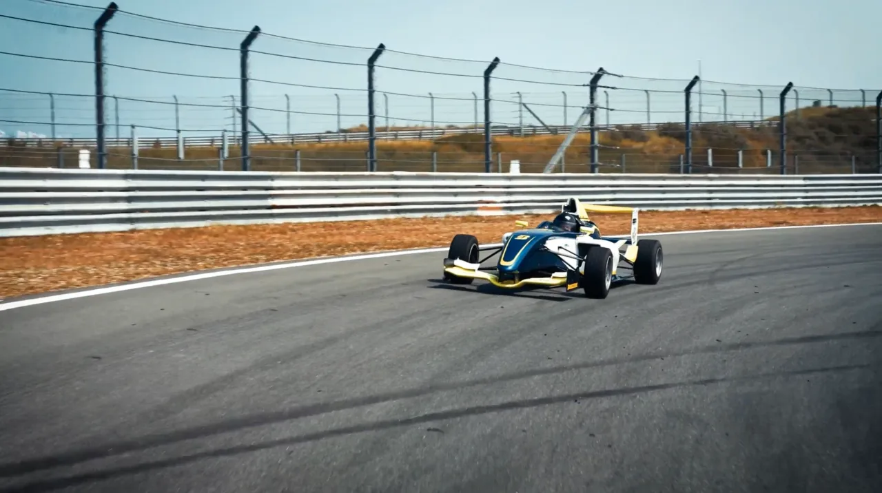 A single-seater racing car on a circuit
